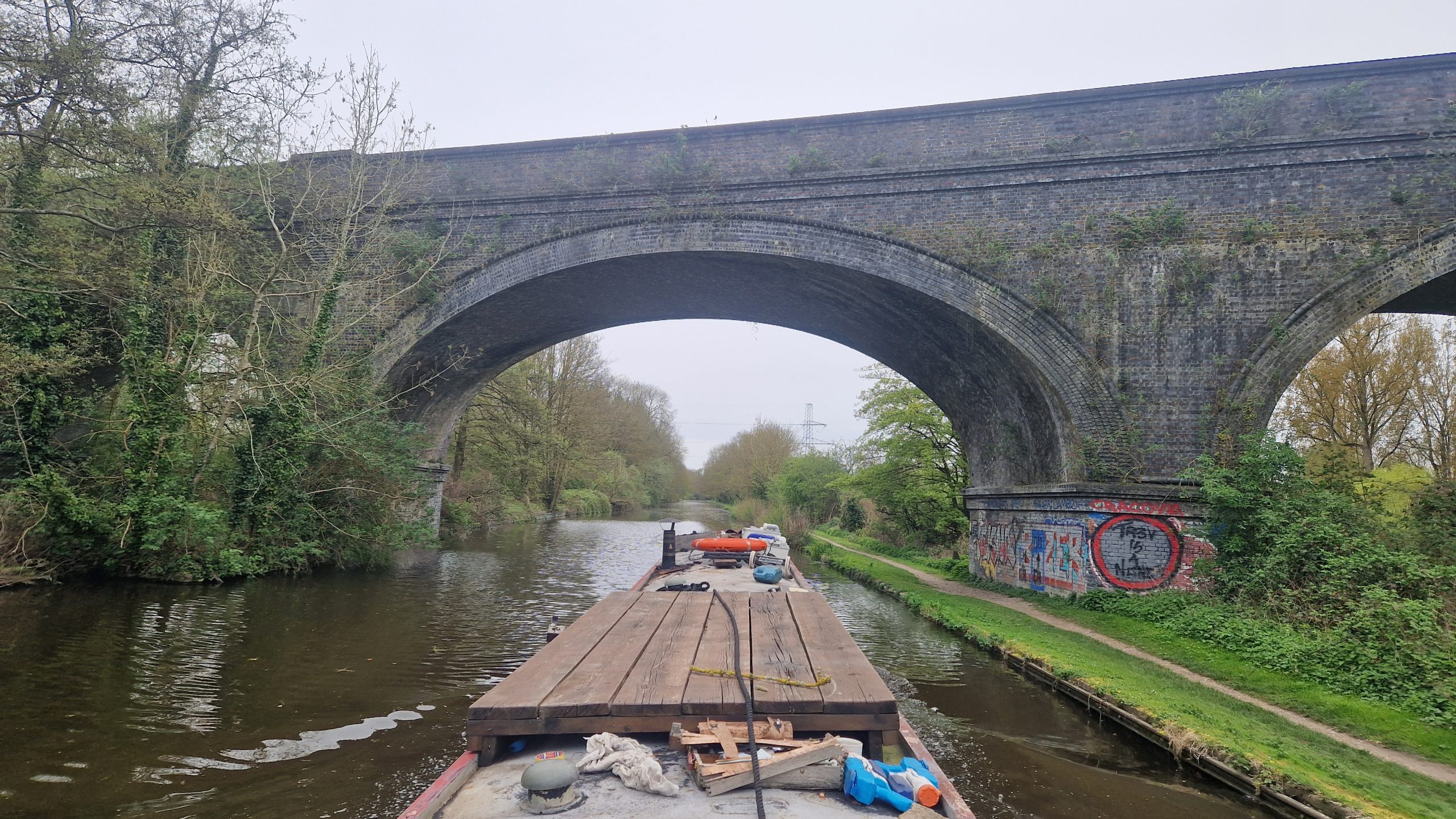 narrowboat travelling long distance along UK canal network